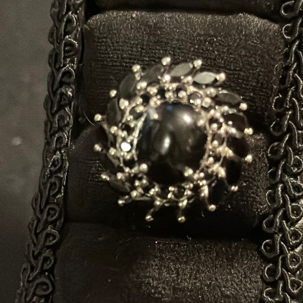 Black Cut Marquee & Round Stones around Center Cabochon Stone